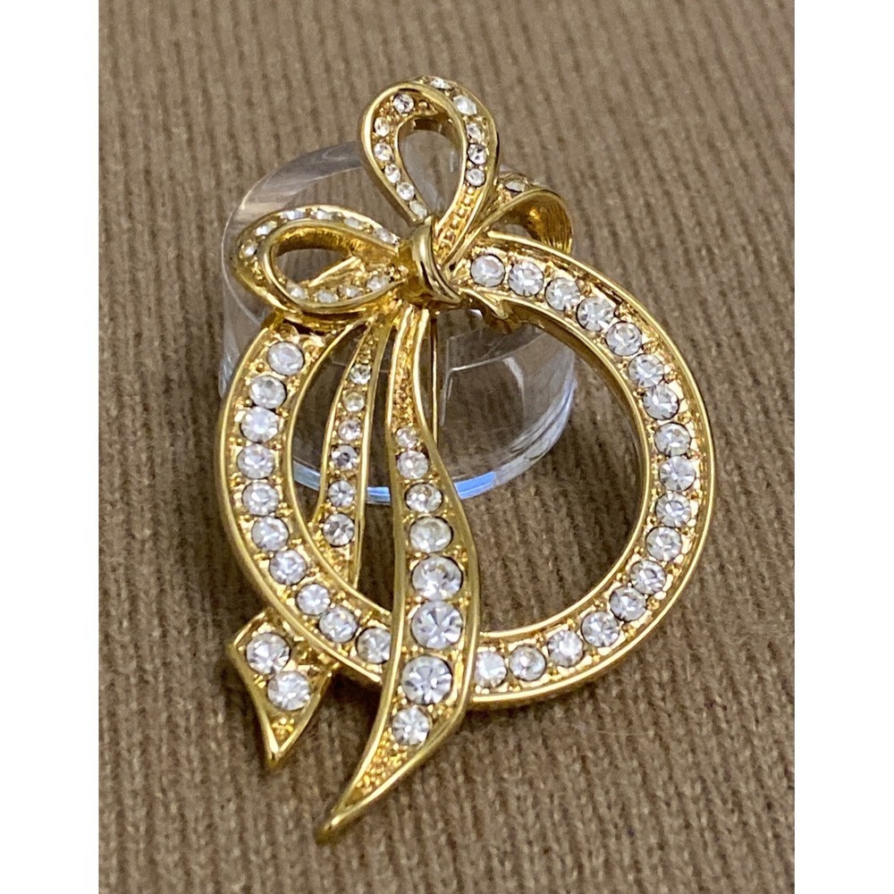 VNTG Designer Signed Rhinestone Fancy Brooch W/ Gold Wash Ribbon Nolan Miller